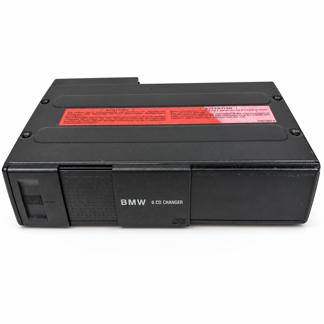 Used BMW 82111469404 six-disc CD changer - front and top with sliding door closed