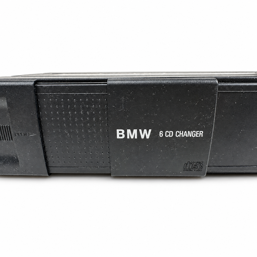 Used BMW 82111469404 six-disc CD changer - front sliding door detail