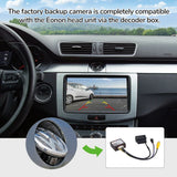 Black A501 rearview backup camera decoder box with silver trim, shown in side view of VW to Eonon car stereo unit.