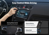 Hand controlling 7-inch QLED wireless CarPlay with visible steering wheel, buttons, and black rotary knob.