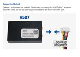 Black A507 B&O amplifier decoder adapter with illuminated white label, shown connected to a multicolor car stereo power cable.