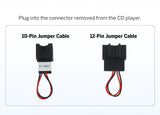 White A508X decoder box with red and black jumper cables, shown on a light gray surface with visible branding.