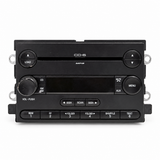 Ford F-150 6L3T-18C815-JE six-disc MP3 radio front showing used cosmetic wear