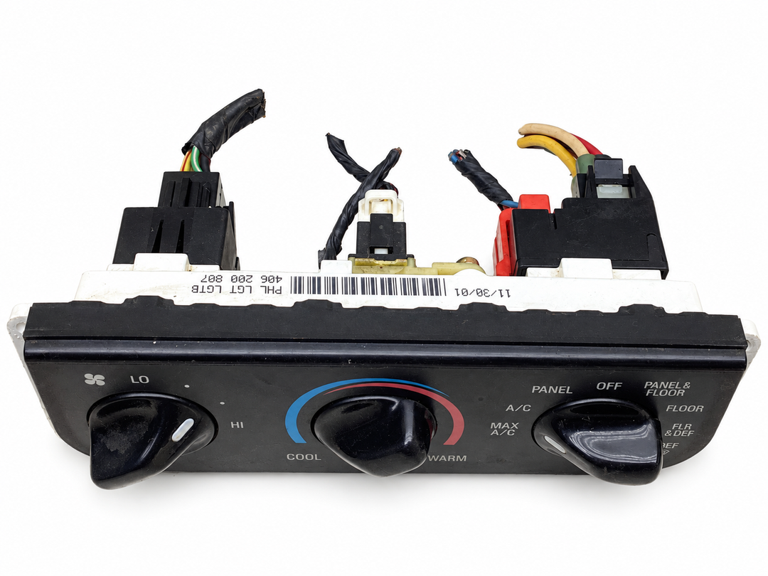 Ford YL3H-19E764-A climate control upper view with wiring on white background