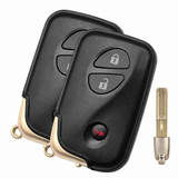 Two Lexus HYQ14ACX three-button smart key fobs and emergency blade