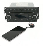 2008-2011 Dodge Dakota AM/FM 6-Disc CD DVD Radio with Auxiliary Input 05064923AE REQ - product image