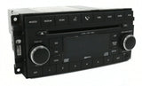 2008-2011 Dodge Dakota AM/FM 6-Disc CD DVD Radio with Auxiliary Input 05064923AE REQ - product image