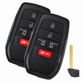 Two empty Toyota Sienna five-button key housings with emergency insert detail