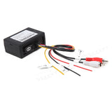 Black Eonon A0581 optical fiber decoder box with multiple RCA and S-Video input cables, shown on a light gray surface.