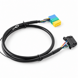 Mini ISO radio adapter harness with black connector and blue green yellow blocks, rear view
